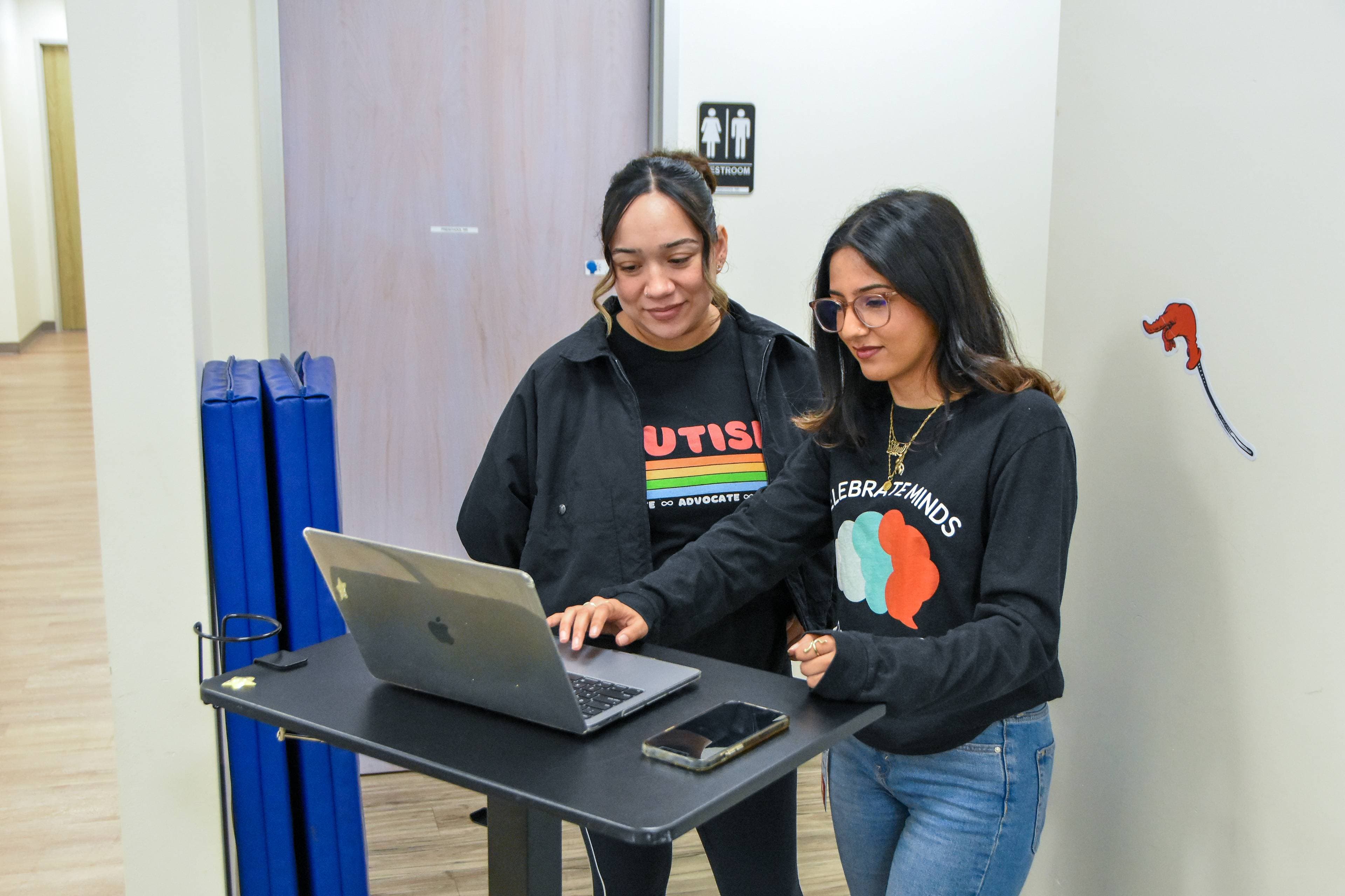 Mindcolor team members collaborating in modern therapy center