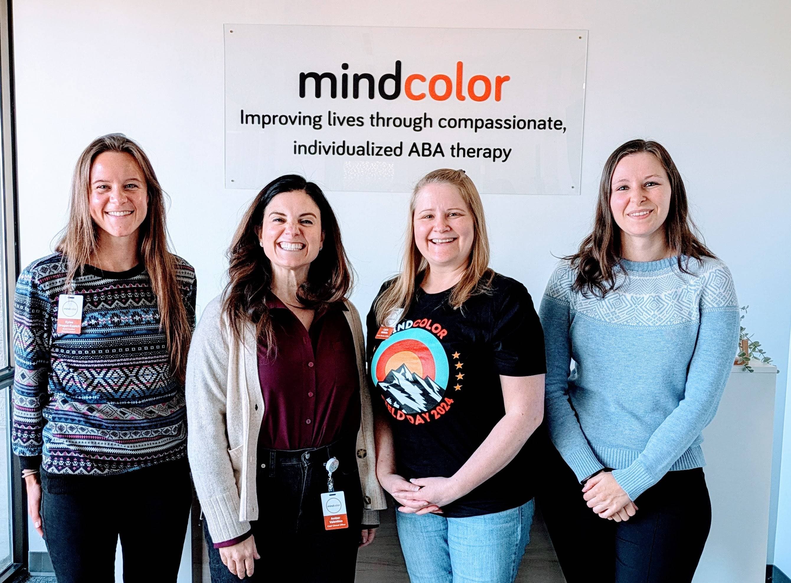Mindcolor team members collaborating in modern therapy center