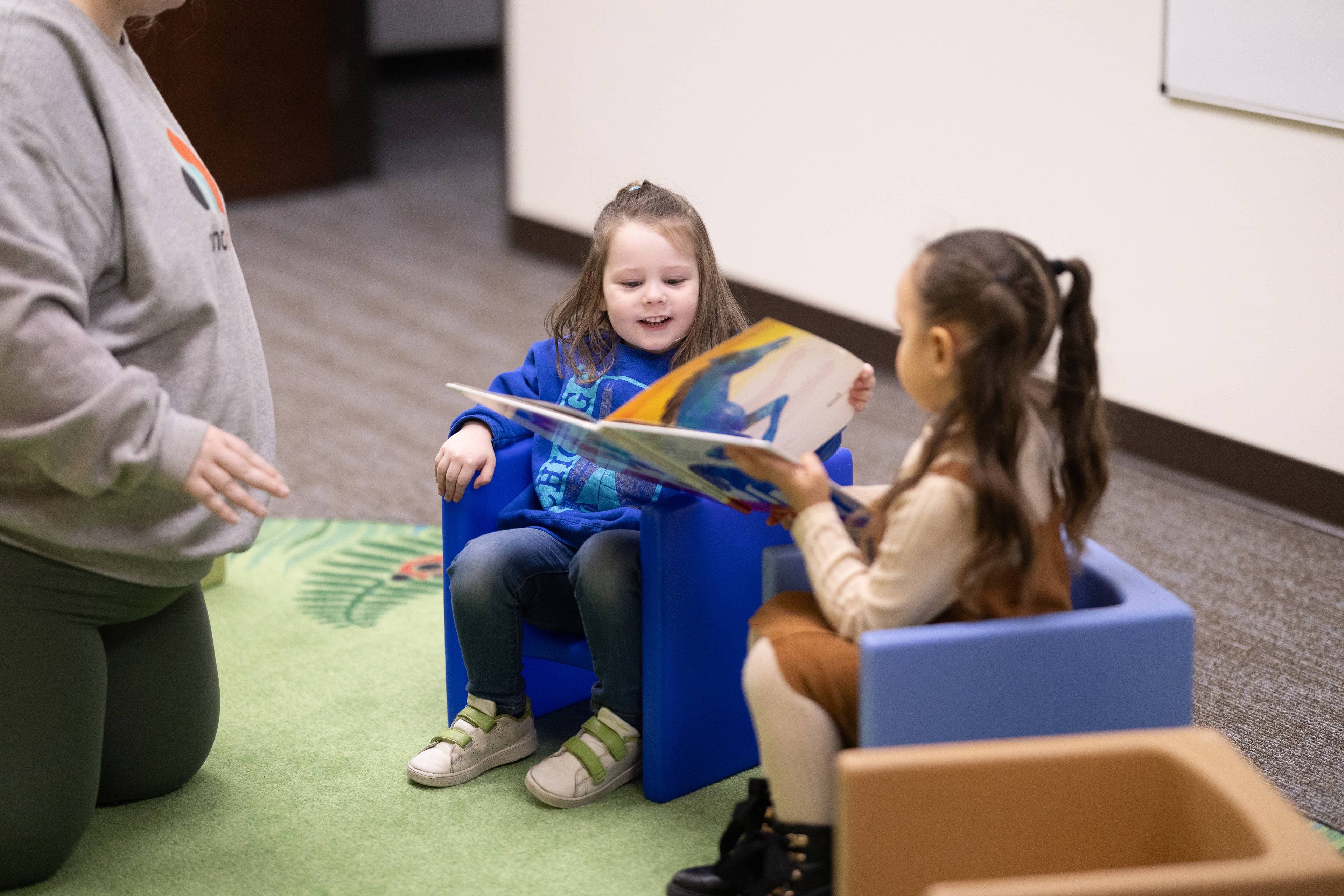 Mindcolor therapist guiding a child through structured learning activities